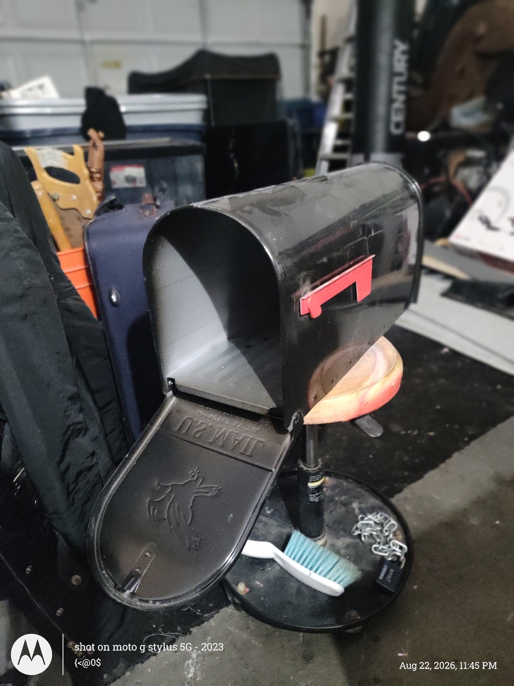 Source Unknown Black Mailbox with Red Flag